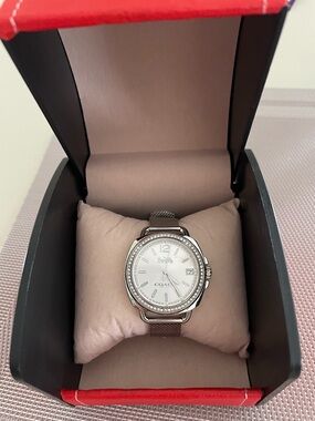 Coach Silver Tone  Swarovski Crystal Watch with silver mesh strap.